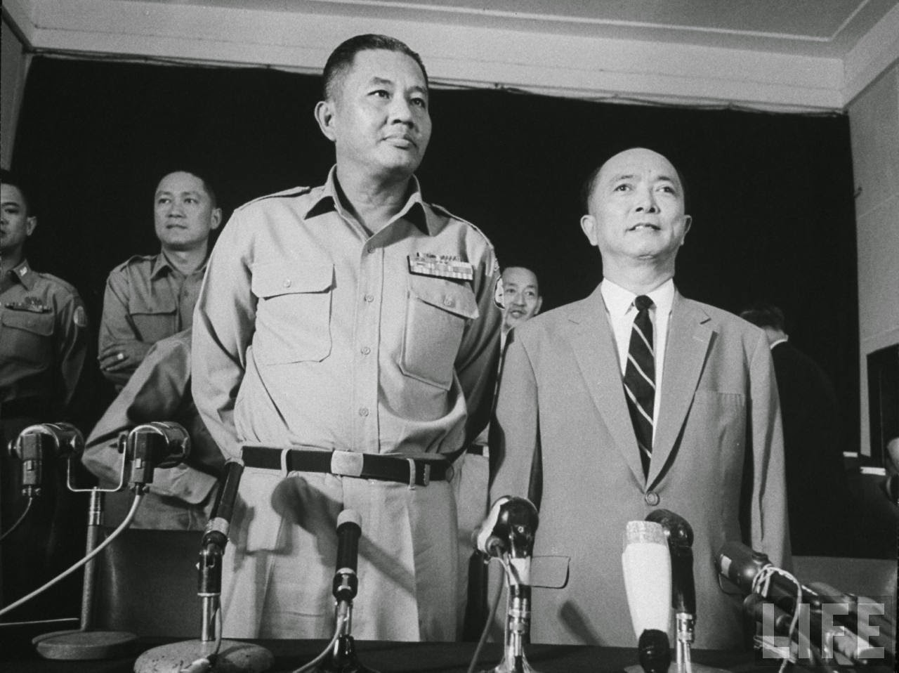 209-2-11-1963-major-general-co-leader-of-military-coup-that-overthrew-diem-regime-van-minh-duong-l-with-new-prime-minister-nguyen-ngoc-tho-r
